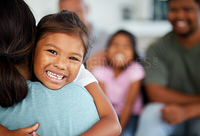 Buy stock photo Family, Indian and girl hug mom with happy smile and laugh, excited at home. Love, laughing and men and women with kids in India. Fun, parents and kids relax on weekend, mother and daughter together