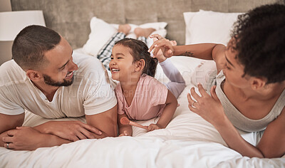 Buy stock photo Happy, black family and bed time of parents and a child with a smile in a home bedroom together. Mother, man and young kid laughing and bonding with happiness and fun in a house at night or morning