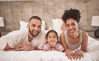 Buy stock photo Relax, love and family in bedroom portrait with Mexican mother and father together with child. Young, happy and joyful parents in Mexico enjoy morning leisure with daughter on bed in home.


