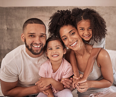 Buy stock photo Love, family and hug portrait in bedroom with Mexican parents and young kids in pyjamas. Cheerful and happy latino relatives enjoy morning cuddle together to show care and appreciation.
