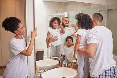 Buy stock photo Father teaching kids to brush teeth in bathroom, happy mom photograph children learn dental health and morning in miami home. Parents clean mouth, personal hygiene and photo of family check mirror