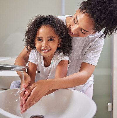 Buy stock photo Mom, girl and bathroom washing their hands for health and hygiene in house. Child, water and mother teaching to wash germs, on palm and fingers to keep immune system healthy, stop bacteria and virus