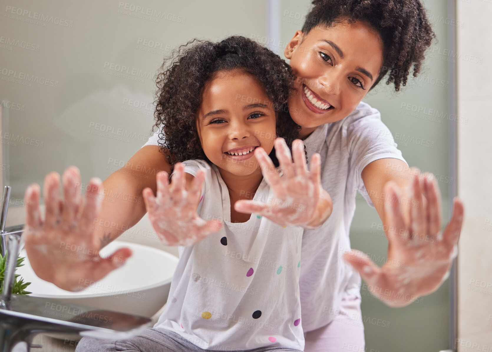 Buy stock photo Woman, child and washing hands in bathroom, cleaning to prevent germs and virus in home. Soap, water and hygiene, girl and mom from Brazil. Teaching, learning a clean morning routine and happy family