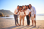 Big family, travel and children on beach vacation with parents and grandparents enjoying summer and fun tropical trip in Brazil together. Portrait of happy men, women and girl kids on holiday

