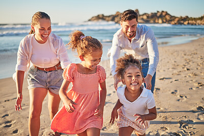 Buy stock photo Ocean, holiday and happy family running on beach on a summer vacation. Mom, dad and girl children laugh and run in sea sand on a sunny weekend. Man, woman and kids enjoy sunshine and waves in Brazil.