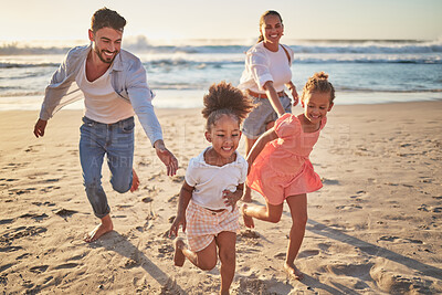 Buy stock photo Family, beach and kids with parents running on sand on summer holiday. Mom, dad and children at ocean at sunset in Mexico. Freedom, fun and vacation, happy man and woman playing with girls at the sea