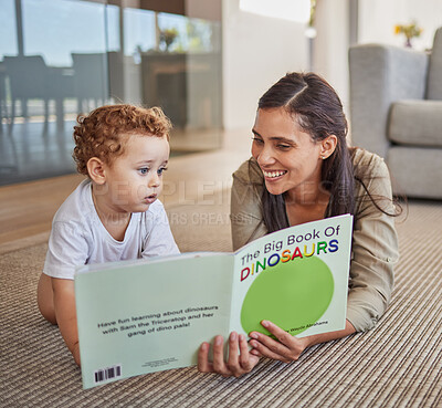 Buy stock photo Mom, child and reading dinosaur books on living room floor at family home for educational fun, learning and happy development. Mother playing, learning and teaching kids animal story with baby boy