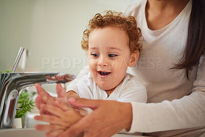 Buy stock photo Mother, baby and bathroom cleaning their hands for health and hygiene in home. Child, water and mom teaching to wash dirt on palm and fingers to stop germs, bacteria and virus for kid bodycare