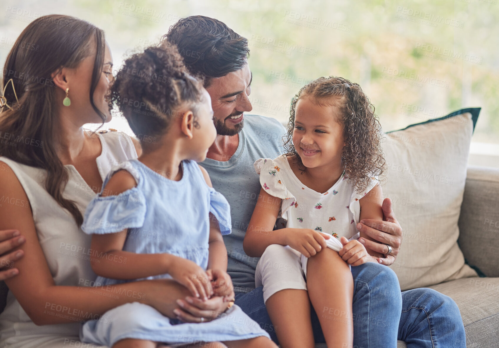 Buy stock photo Happy, relax and love with family in sofa in living room together for lifestyle, care and support. Smile, youth and development with parents and children sitting on couch for happiness at home