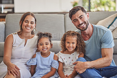 Buy stock photo Portrait, happy family in home living room and smile bonding together by sofa. Love, relax and caring parents or dad, mom and girls from Spain spending quality time, care and support in house lounge
