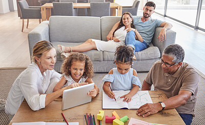 Buy stock photo Family, education and grandparents helping kids with development learning schoolwork in drawing book and tablet. Old man and elderly woman teaching children with mother and dad relaxing on home couch