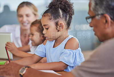 Buy stock photo Love, support and learning, grandparents with kids writing and encouragement to study. Family, child development and grandpa and grandma teaching girl to write and online with tablet and home school.