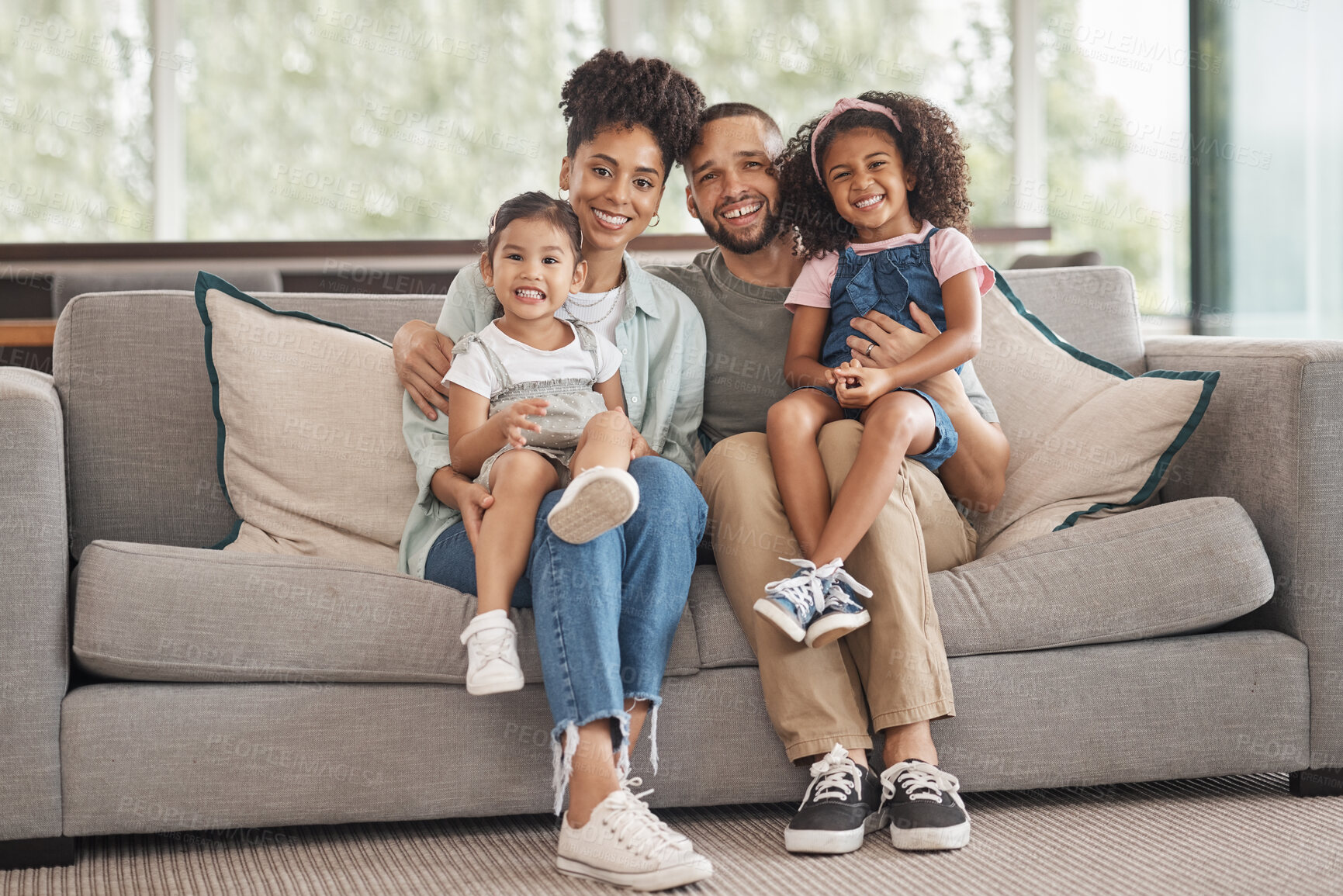 Buy stock photo Happy interracial family on sofa portrait of children and parents or mother and father for love, care and support. An immigrant Mexico dad and mom with Asian and african kid together on lounge couch