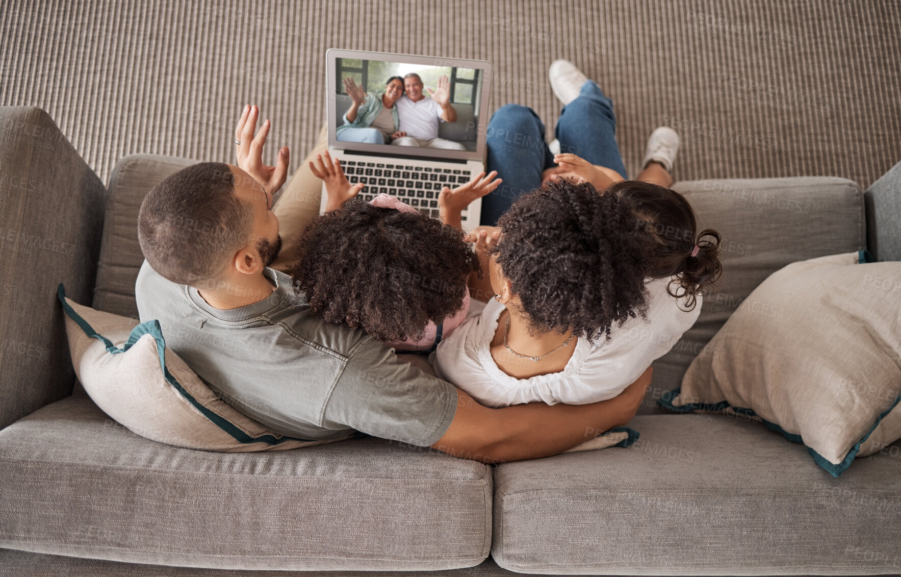 Buy stock photo Love, laptop and family on video call with grandparents for global, international or world communication above view. Mom, dad and girl relax on sofa while talking, bond and enjoy online conversation