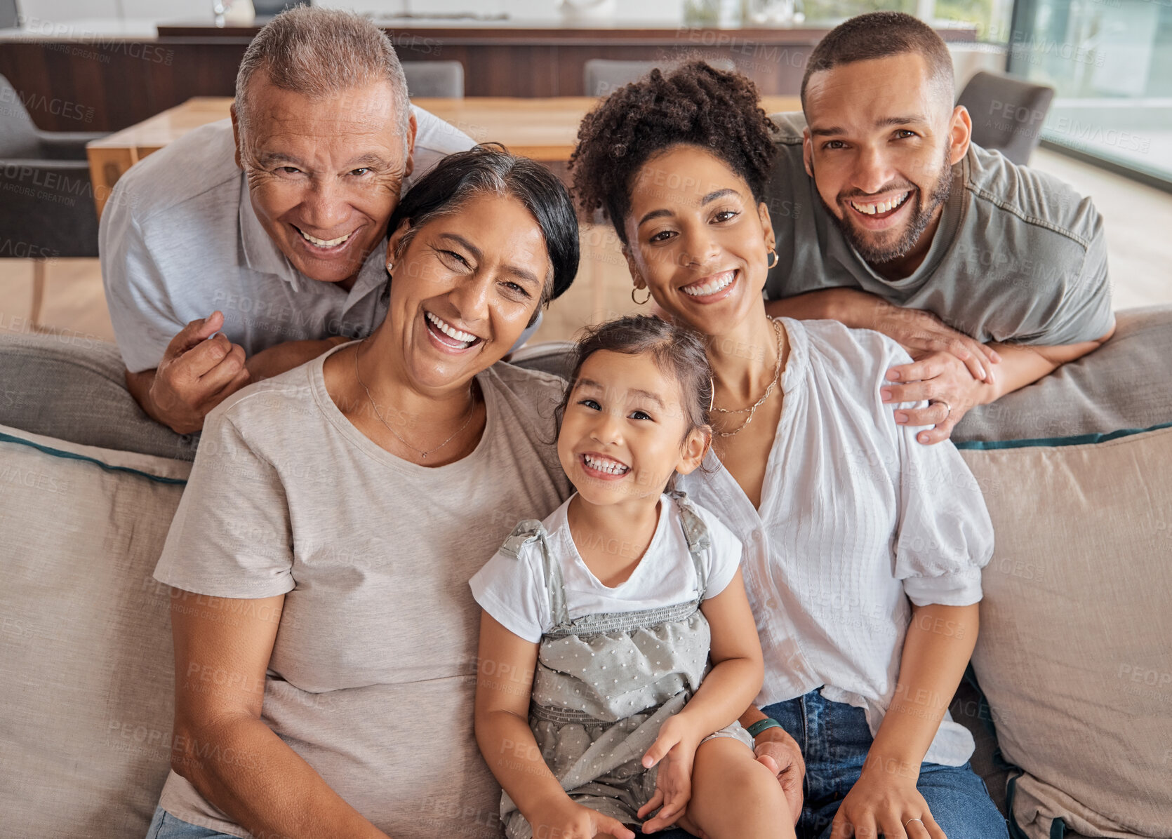 Buy stock photo Happy family of couple, grandparents and child on sofa in living room happy for love, care and reunion at family home. Big family or people bonding together, excited and happiness sit in house lounge