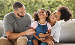 Love, relax and happy family laugh on sofa together for leisure in Mexico with caring parents. Mexican mother and father enjoy tickling game on couch with young daughter for bonding fun.  


