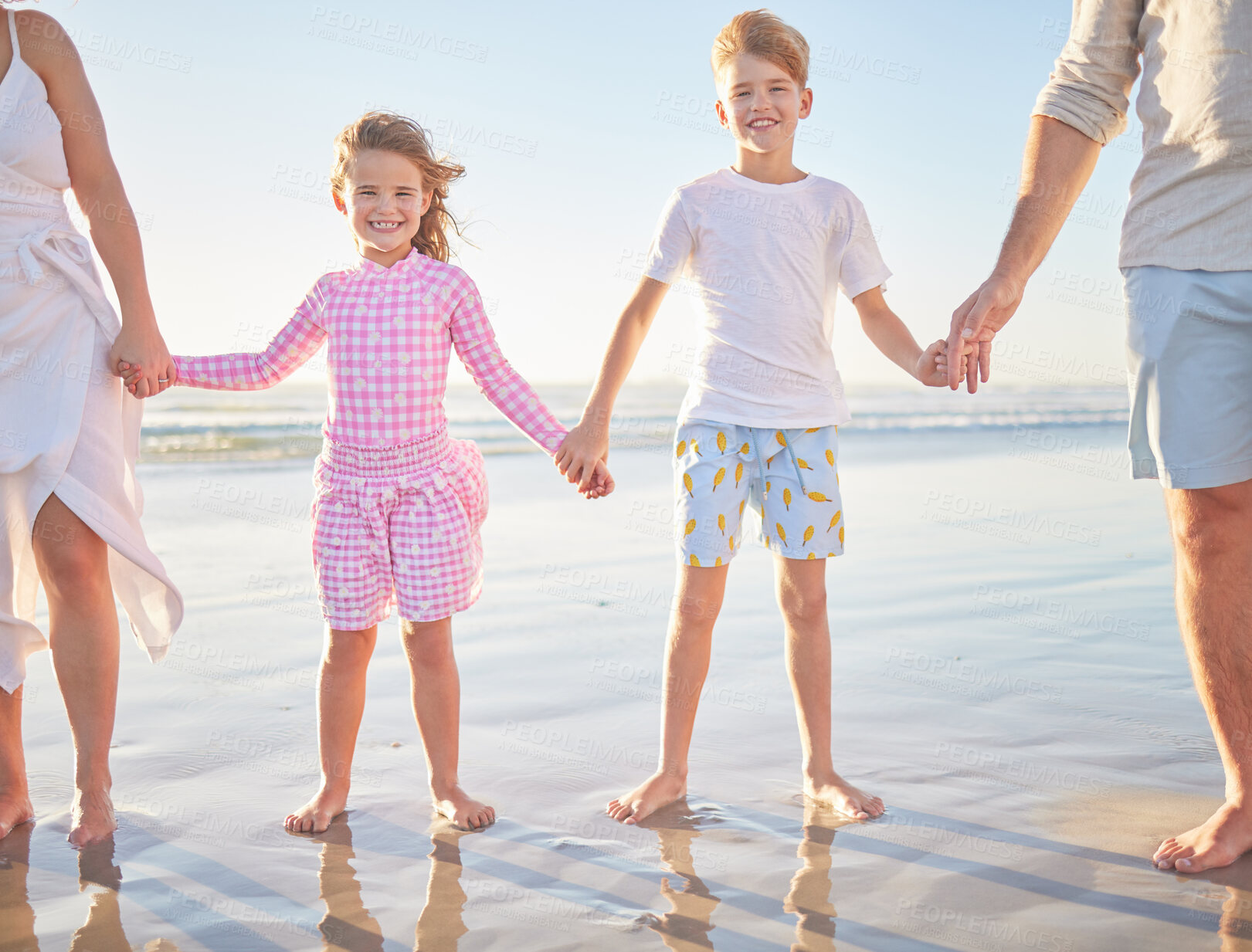 Buy stock photo Happy family love, beach and hands of children together with parents while having outdoor fun and enjoy quality time. Young kids, youth or siblings connect, bond and relax on water, sea or ocean sand