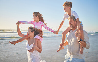 Buy stock photo Family, kids and holiday at the beach with parents with children on mom and dad shoulder.  Vacation, having fun and taking a walk by the ocean. Summer, seaside and exercise in the morning by the sea