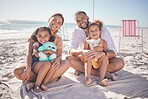 Family, kids sitting on sand on beach holiday, vacation and trip smile, happy and relax. Love, parents and children with toys close to seaside on the weekend for fun, enjoyment and a break in summer.