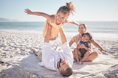 Buy stock photo Happy family, travel and beach holiday with children and parents playing in sand together. Love, nature and mother and father bonding with playful girls on an ocean trip, relax outdoor on vacation