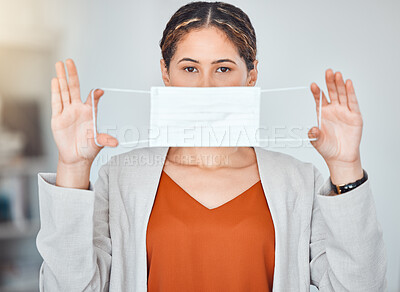 Buy stock photo Business woman, portrait and mask in end of covid taking off face protection against blurred background. Female employee free from corona virus holding and stretching masks of ending or stop pandemic