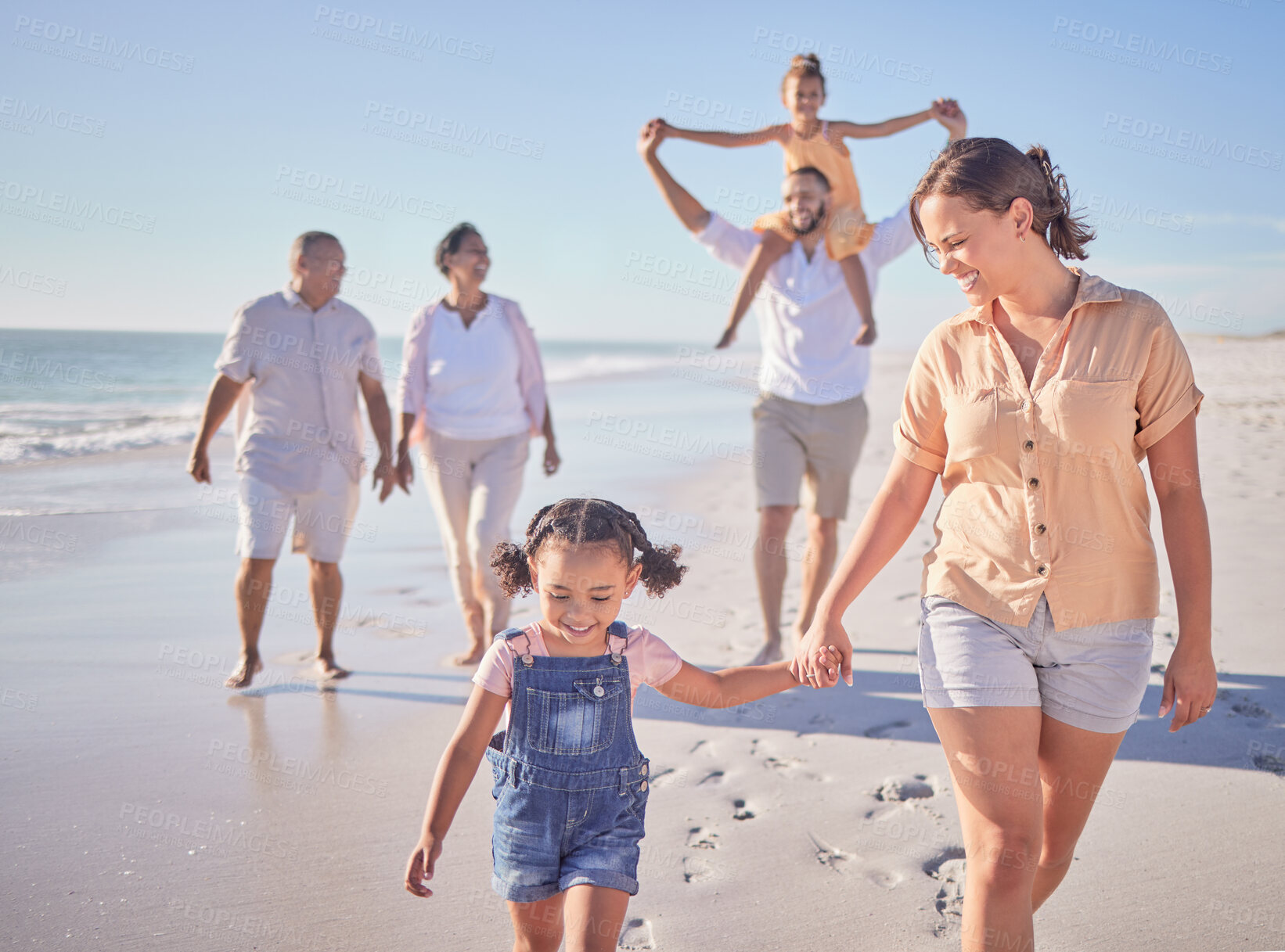 Buy stock photo Family, mother and girl holding hands beach on summer holiday in Mexico. Footprints, memories and a happy woman with child at the ocean. Grandma, grandpa and kids with mom and dad walking on sea sand