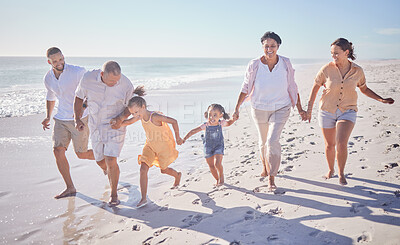 Buy stock photo Beach walk, family summer and children holding hands with grandparents while walking by the sea on holiday. Parents, girl kids and senior people walking by the ocean on travel vacation in Brazil