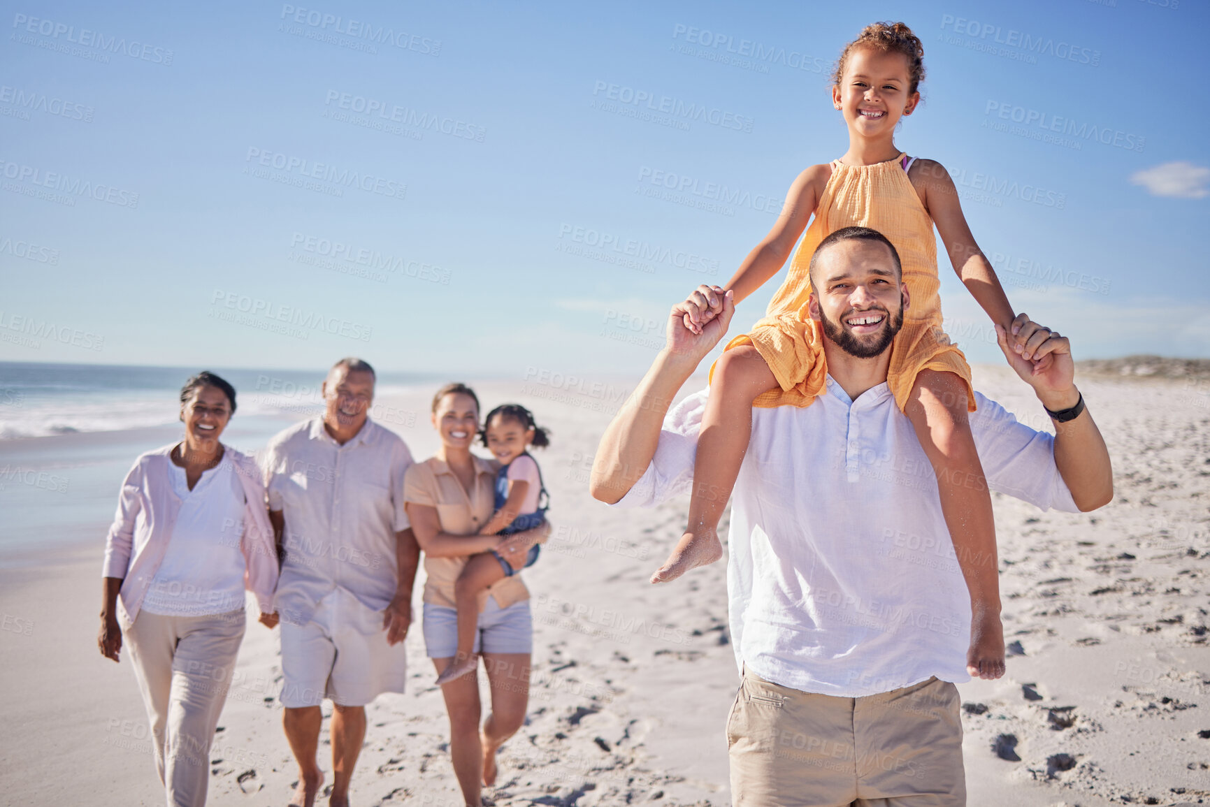 Buy stock photo Beach, father carry girl on walk with family, grandparents and children on holiday, vacation and break. Happy, smile and excited parents with kids enjoy weekend getaway having fun and relax on sand. 
