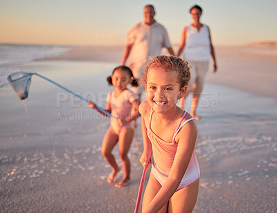 Buy stock photo Children, fishing and family with a girl at the beach with her grandparents and sister for summer holiday. Kids, happy and ocean with a child on sand by the sea with her grandmother and grandfather