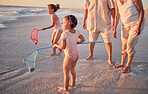 Learning, beach and children fishing in the ocean with parents, bonding and having fun with fishing net in nature. Kids, teaching and happy family bonding in sea water with girl playing enjoy summer