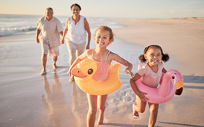 Buy stock photo Beach walk, family summer and children running with grandparents while walking by the sea on holiday. Senior couple, girl kids and  walking by the ocean on travel vacation in Hawaii during sunset