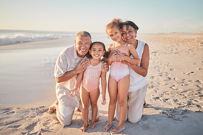 Buy stock photo Grandparents with children, happy on beach on holiday and enjoying retirement. Grandpa, grandma and kids enjoy  afternoon playing in ocean summer sun. Family love time together by the sea and sand
