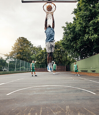 Buy stock photo Basketball, player and winner on court jump, makes basket and score, celebration and victory playing against team. Competition, game day and dunk ball in net excited, practice and winning the game. 
