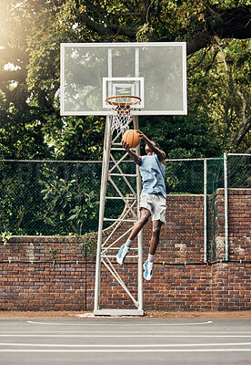 Buy stock photo Basketball, jump and sports man on basketball court working on game fitness, workout or slam dunk training. Motivation, health and street basketball player or athlete exercise for competition success