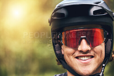 Buy stock photo Nature, cycling and man with helmet portrait and excited face with goggles for adventure closeup. Happy and young athlete male with smile ready for sports activity with head protection mockup.

