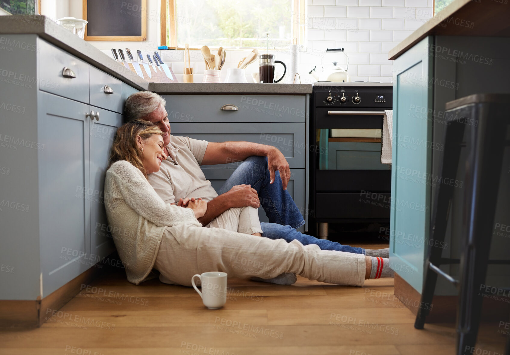 Buy stock photo Couple, retirement and kitchen on floor in home together, romance and love in house. Smile, memory and people remember time, marriage and journey, bonding and happy on flooring in family home