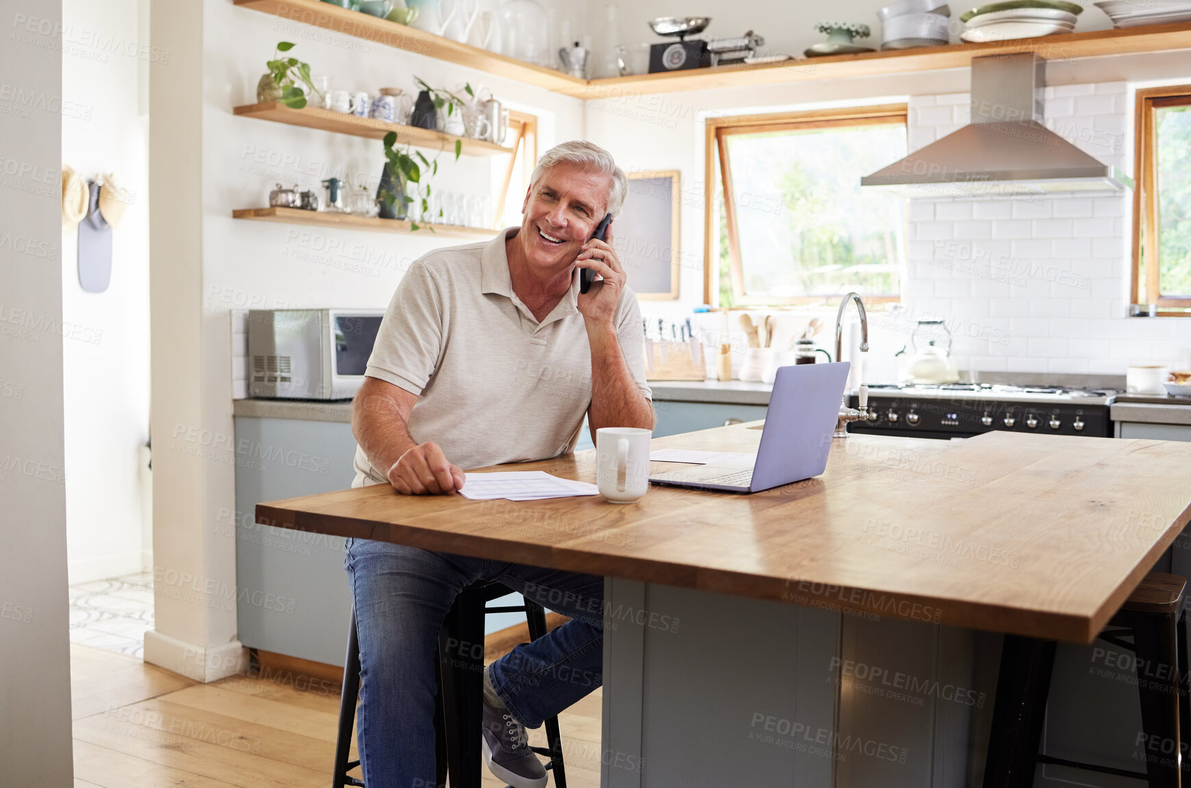 Buy stock photo Call, laptop and finance with a senior man using a phone while planning finance, savings and investment for retirement. Computer, money and communication with an elderly male pensioner in the kitchen