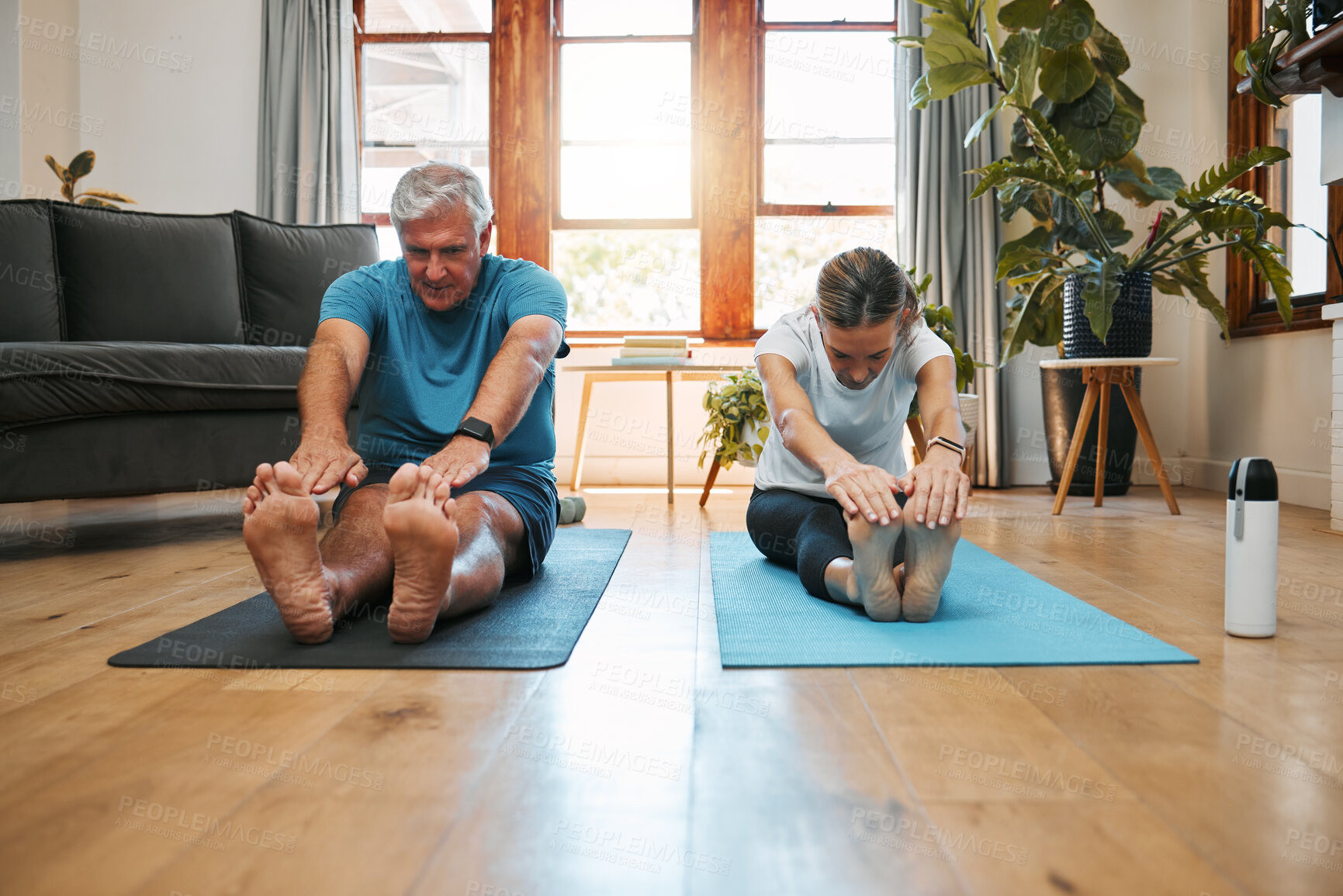 Buy stock photo Yoga stretching, home workout and mature couple fitness in living room for wellness, exercise and healthy lifestyle in Australia. Senior man, relax woman and pilates training, energy and strong body