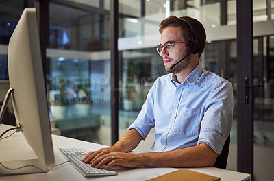 Buy stock photo Call center, web communication and businessman working as consultant as telemarketing company in dark office. Customer service worker consulting on internet during night shift and overtime at startup