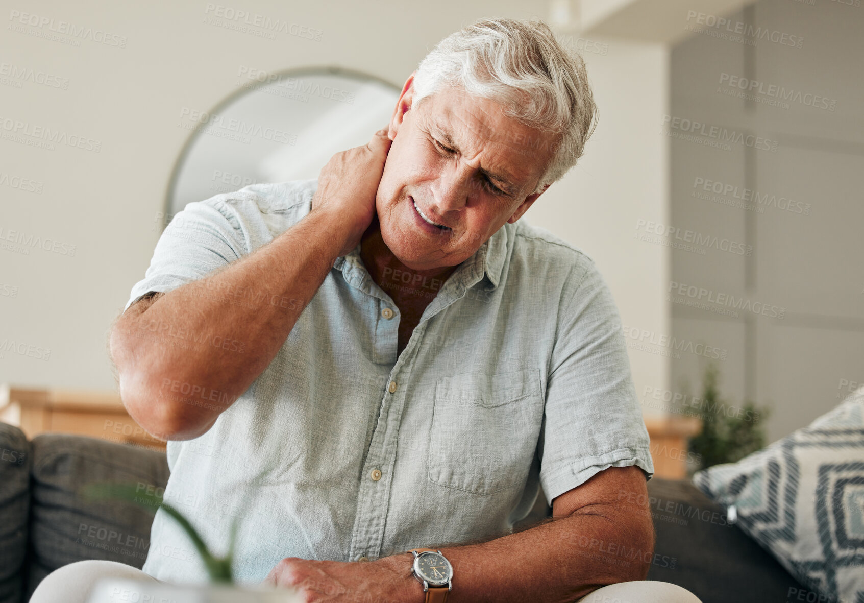 Buy stock photo Senior man, neck pain and stress sitting at home with spine injury massaging muscle for osteoporosis and fibromyalgia. Bad health, tired and elderly male with orthopedic, arthritis and back problem