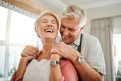 Buy stock photo Love embrace, communication and senior couple holding hands and laughing at funny conversation in the living room of their house. Happy elderly man and woman with smile in retirement together