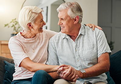 Buy stock photo Couple, love and care with a senior man and woman holding hands on a sofa in the living room of a retirement home together. Trust, safe and happy with an elderly male and female pensioner in a house