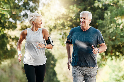 Buy stock photo Health, senior couple and running in nature or park for exercise, fitness and wellness. Retirement, elderly man and woman enjoy walk, fresh air and talk in forest for workout, training and relax.