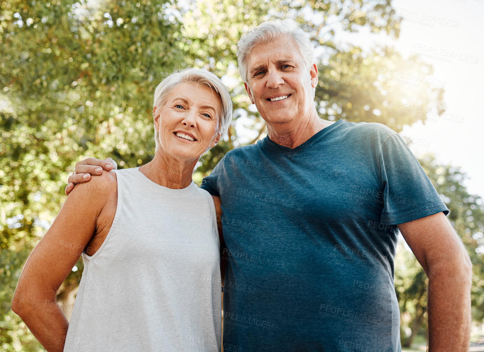 Buy stock photo Old couple, hug and nature portrait smile outdoors, park or outside on break after running, walk or exercise. Health, workout and elderly man and woman, walking or spend quality fitness time together