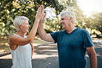 High five, success or senior couple fitness in running workout, exercise or training in nature park or Canada garden. Smile, happy or sports teamwork gesture for retirement man and woman health goals