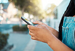 Black woman, hands and phone in city travel with gps location tracking, social media app and New York map. Zoom, tourist or fashion student with mobile communication technology in 5g internet search