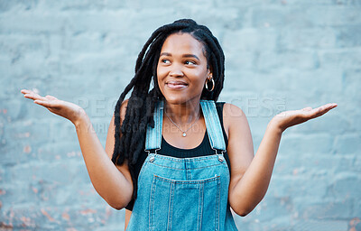 Buy stock photo Model, smile and hands for gesture of confusion pose in street against blue wall. Black woman, question and confused sign in city against urban background with dreadlocks in Cape Town, South Africa