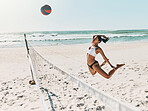 Woman, beach and volleyball for fitness, health and exercise on vacation in the summer. Girl, sports and ocean play with ball on sand to workout for wellness in sunshine on holiday in Cancun, Mexico