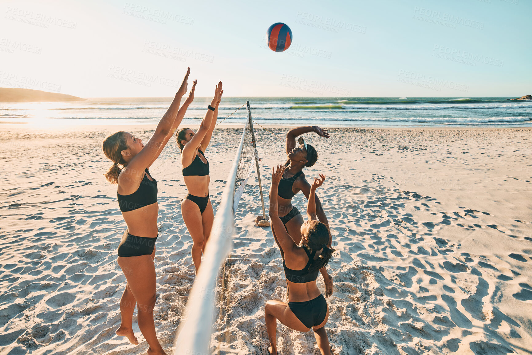 Buy stock photo Volleyball, team sports and women on the beach during group holiday together in Miami in summer. Happy, excited and young friends playing sport game in bikini by the sea on vacation with energy