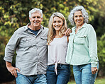 Portrait of mother, father and woman in park on hioliday in Australia together in summer. Happy, relax and love of parents for adult child on vacation in a green garden with family in nature